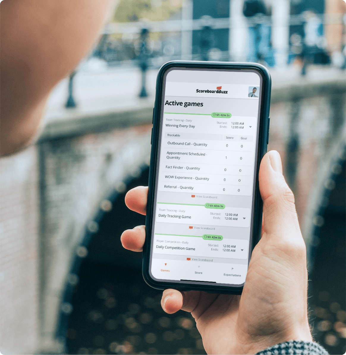 Mobile view of a ScoreboardBuzz dashboard showing gamified accountability metrics
